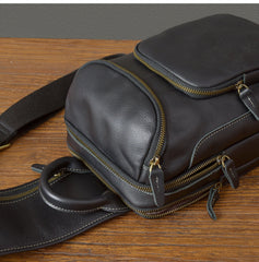 Big sling bag for men - back panel with hidden anti-theft pocket location