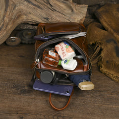 Sling bag for big man - leather texture and stitching detail close-up