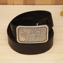 A leather belt with a pattern carving buckle 